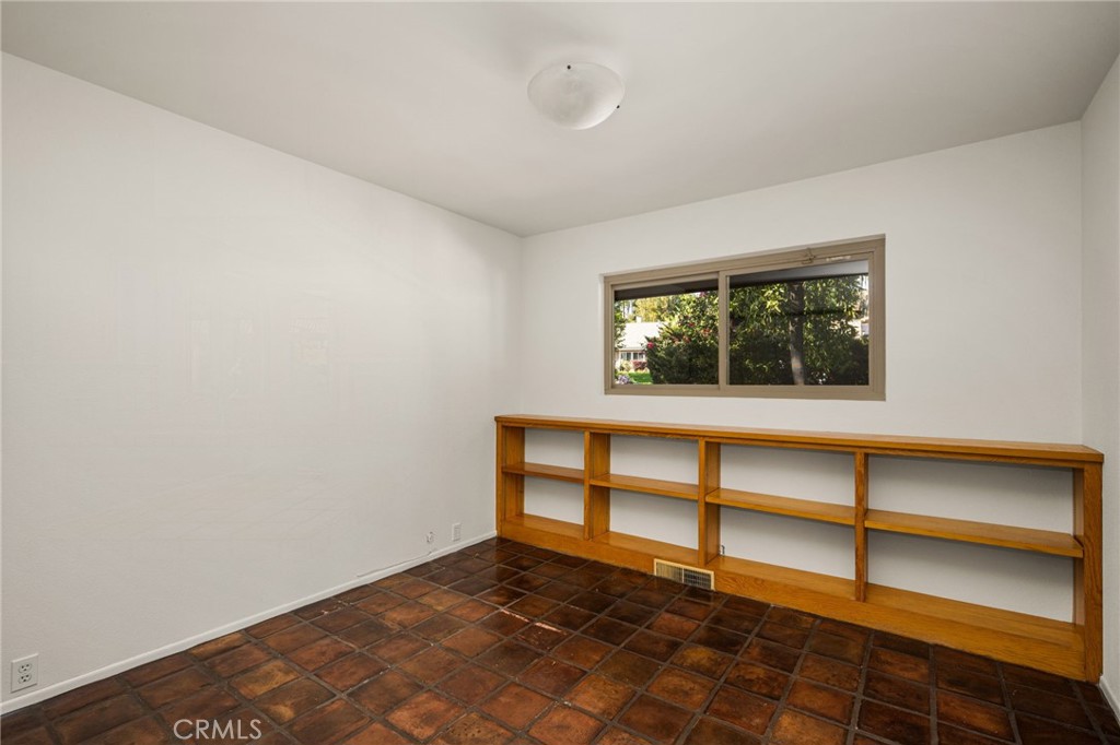 12011 Theta Road North Tustin, CA 92705 - Photo 40 of 49 Another includes pavers and built-in bookcase