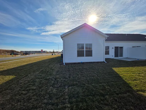 a house with trees in the background