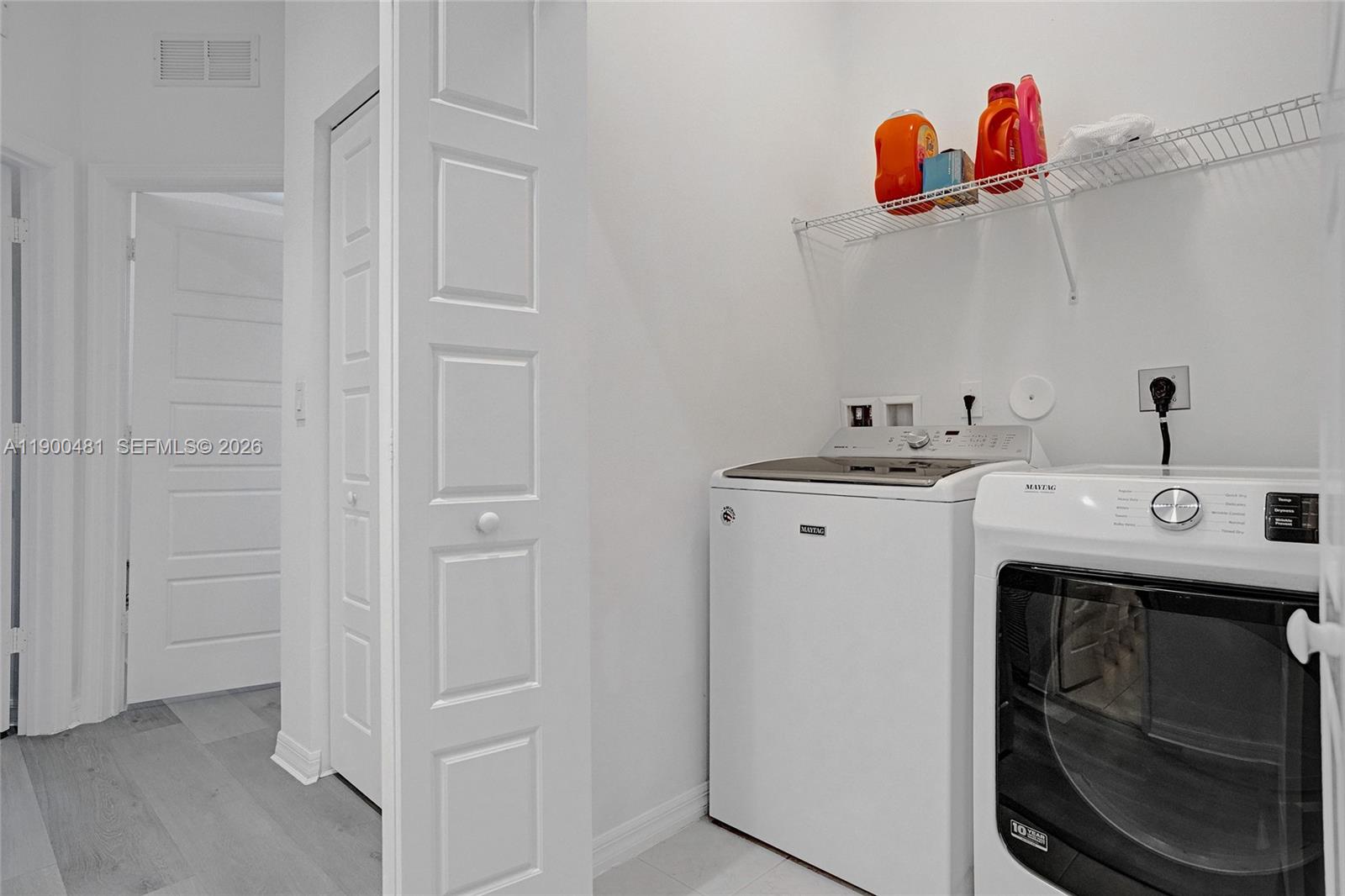 650 Northeast 193rd Terrace Miami, FL 33179 - Photo 20 of 32 a utility room with a sink dryer and washer