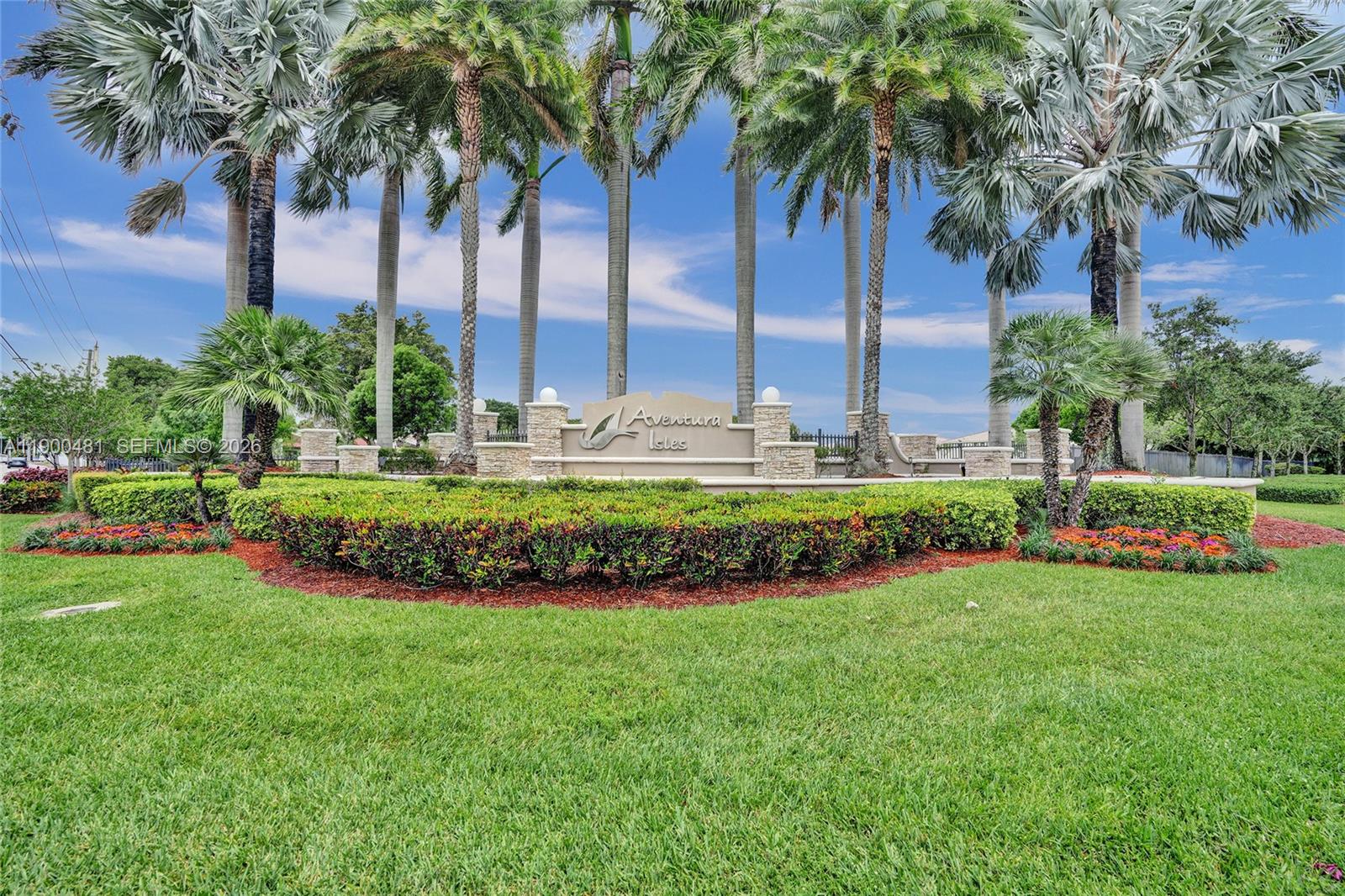 650 Northeast 193rd Terrace Miami, FL 33179 - Photo 31 of 32 a view of a swimming pool with a garden