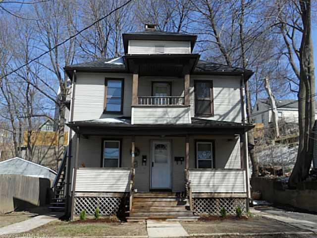 81 Bartholomew Street Bristol, CT 06010 - Photo 1 of 1 a front view of a house with a door
