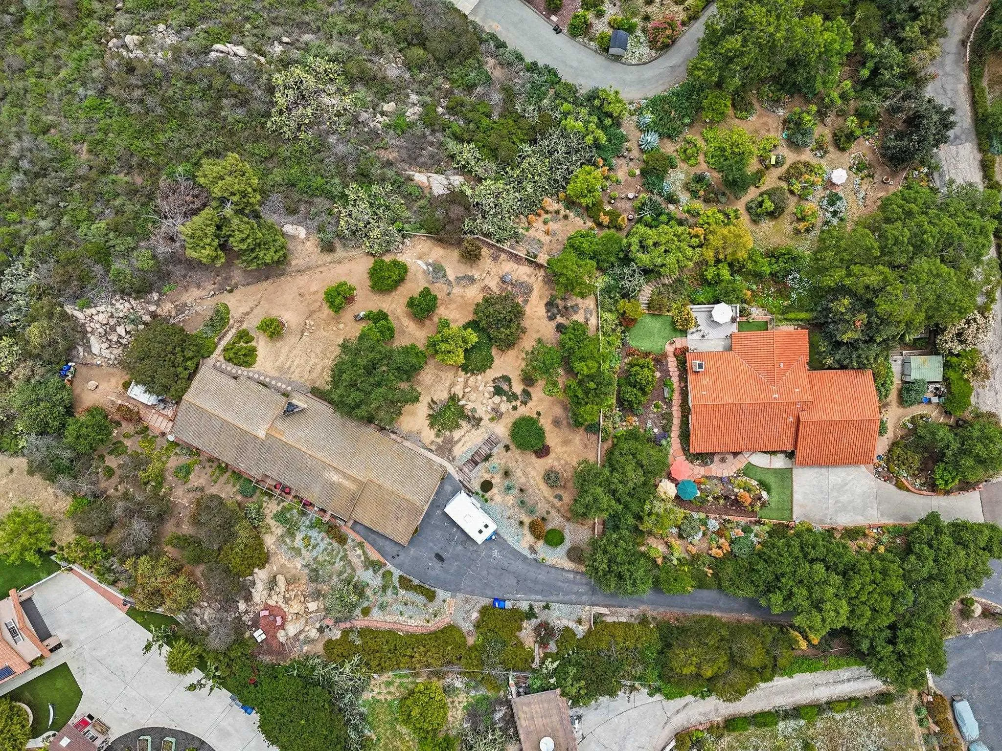 2189 Rockhoff Road Escondido, CA 92026 - Photo 11 of 60 an aerial view of a house with a yard