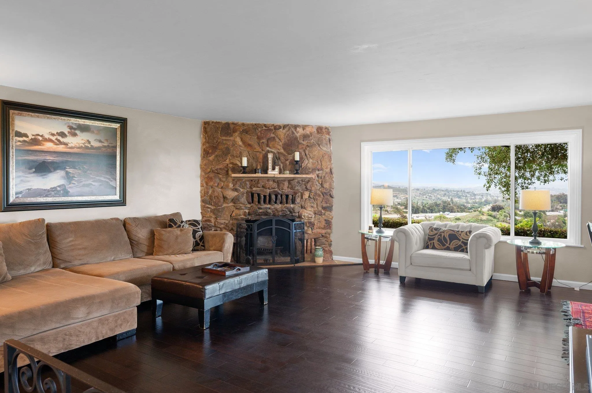 2189 Rockhoff Road Escondido, CA 92026 - Photo 19 of 60 a living room with furniture and a fireplace