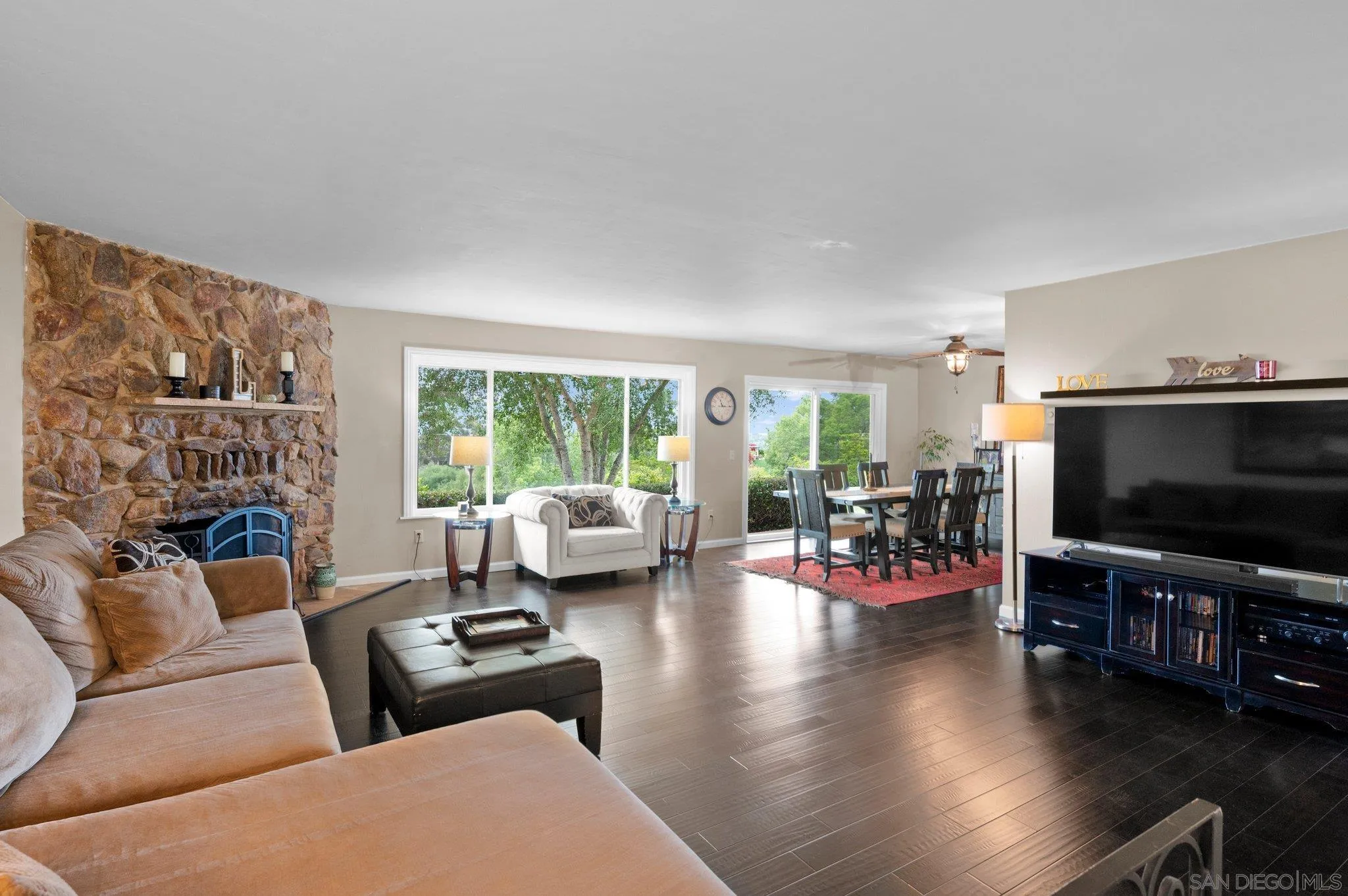 2189 Rockhoff Road Escondido, CA 92026 - Photo 20 of 60 a living room with furniture and a flat screen tv