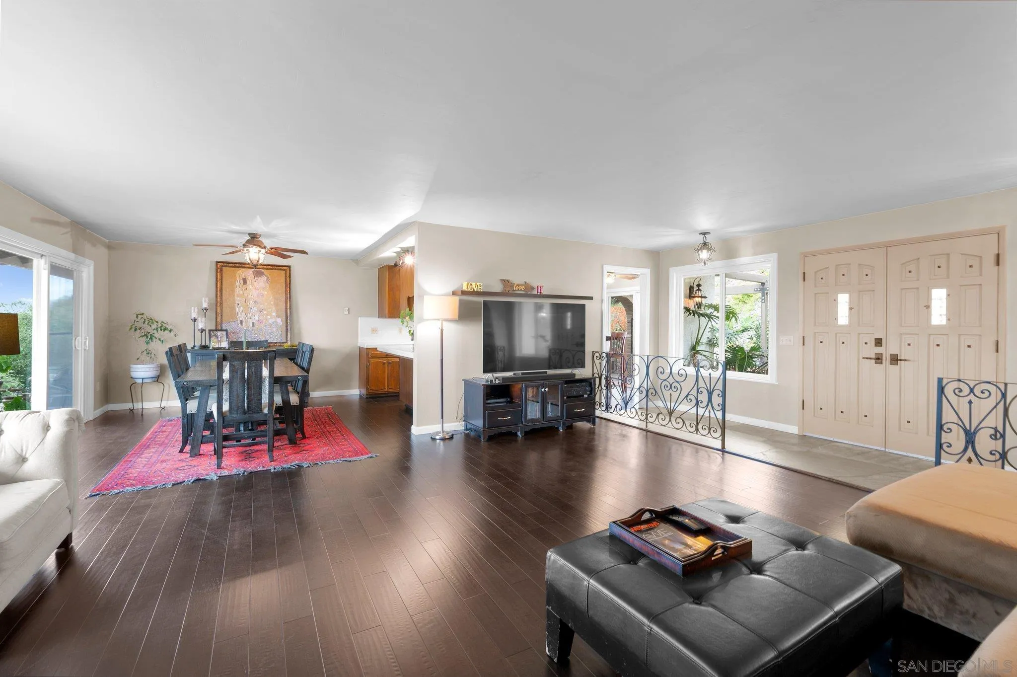 2189 Rockhoff Road Escondido, CA 92026 - Photo 22 of 60 a living room with furniture and wooden floor