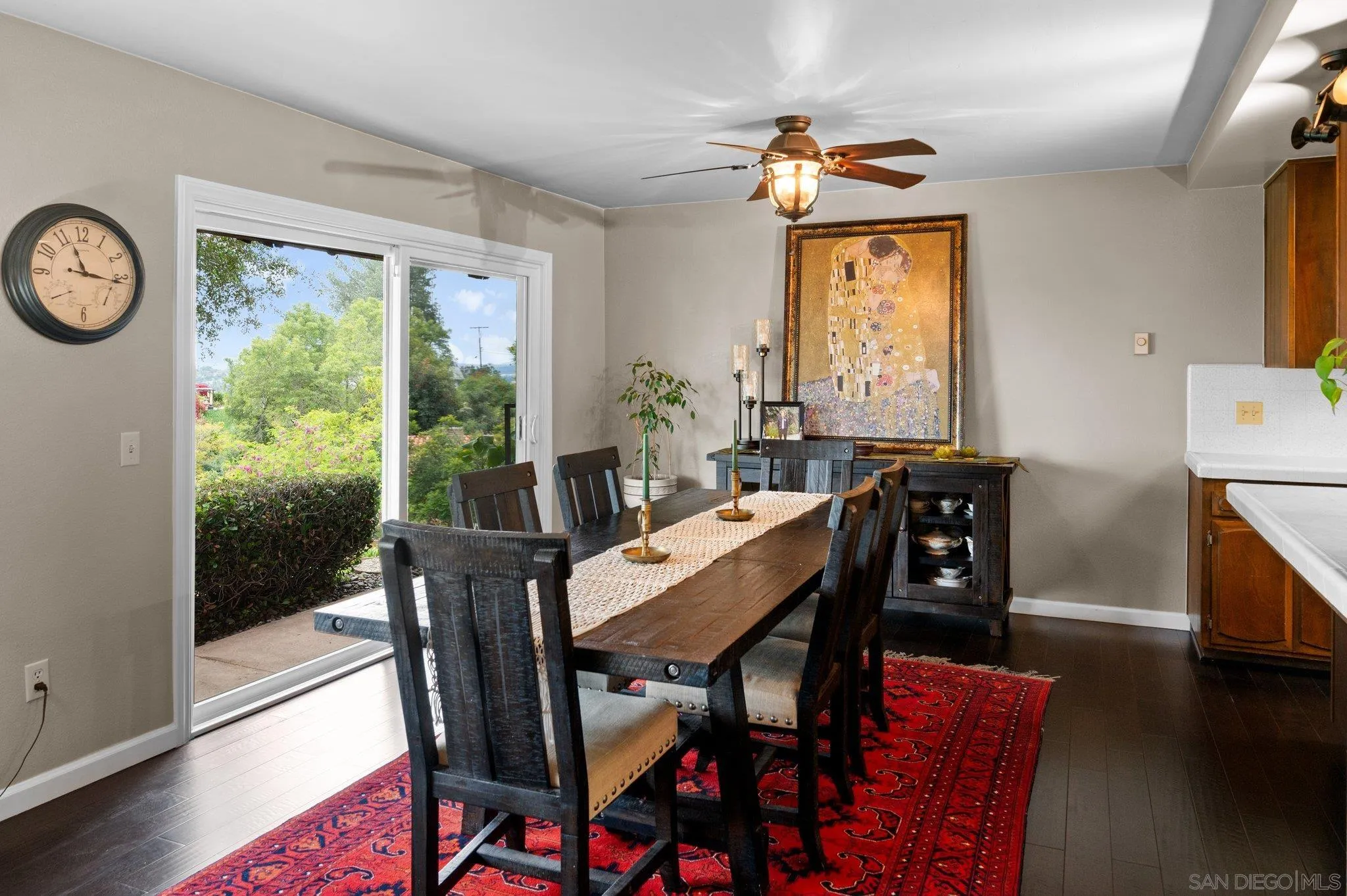 2189 Rockhoff Road Escondido, CA 92026 - Photo 23 of 60 a view of a dining room with furniture window and wooden floor