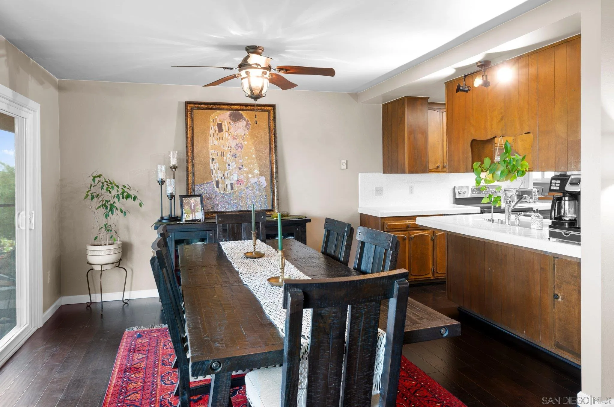 2189 Rockhoff Road Escondido, CA 92026 - Photo 24 of 60 a view of a dining room with furniture window and wooden floor