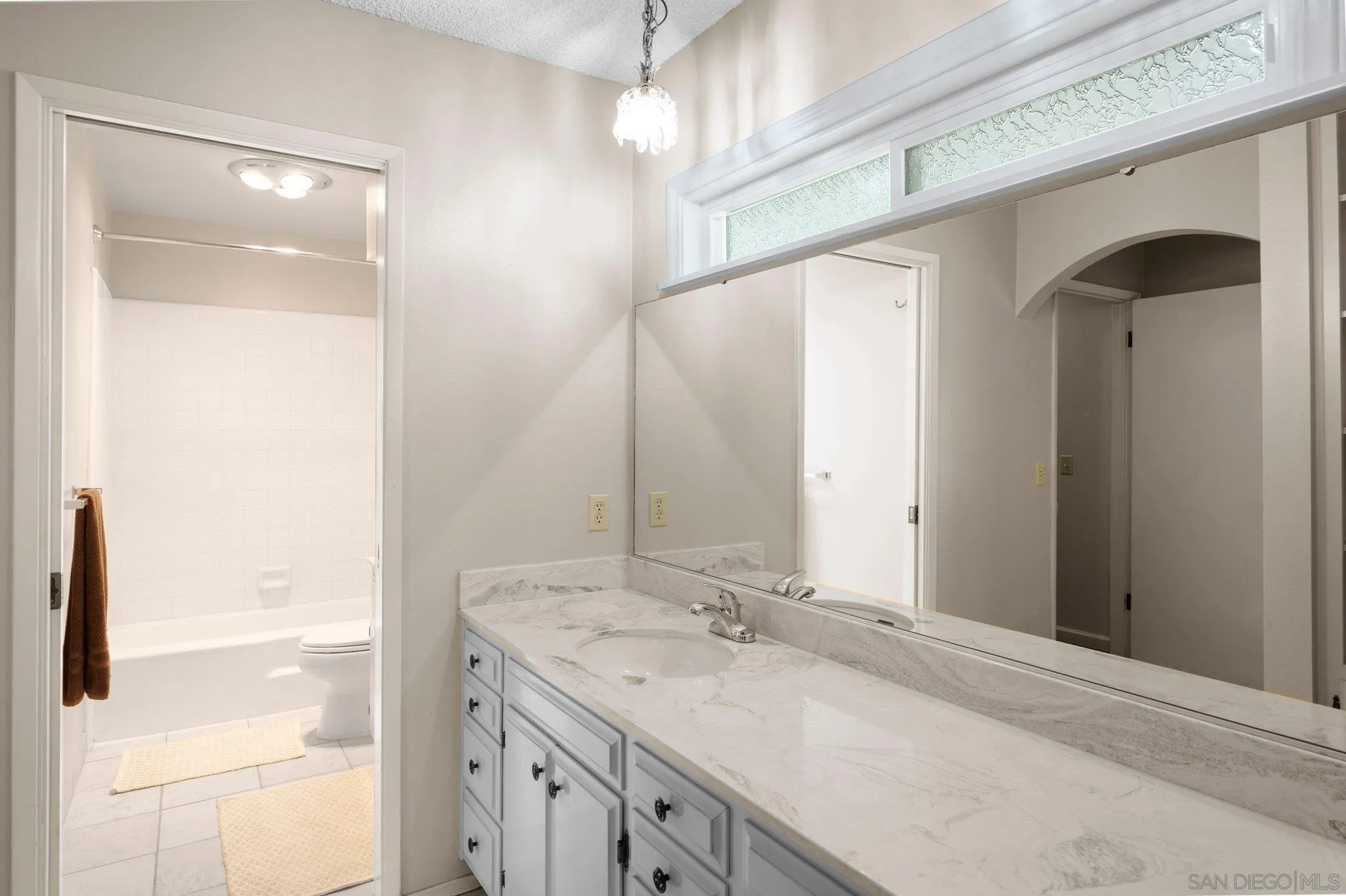 2189 Rockhoff Road Escondido, CA 92026 - Photo 34 of 60 a bathroom with a sink and a mirror