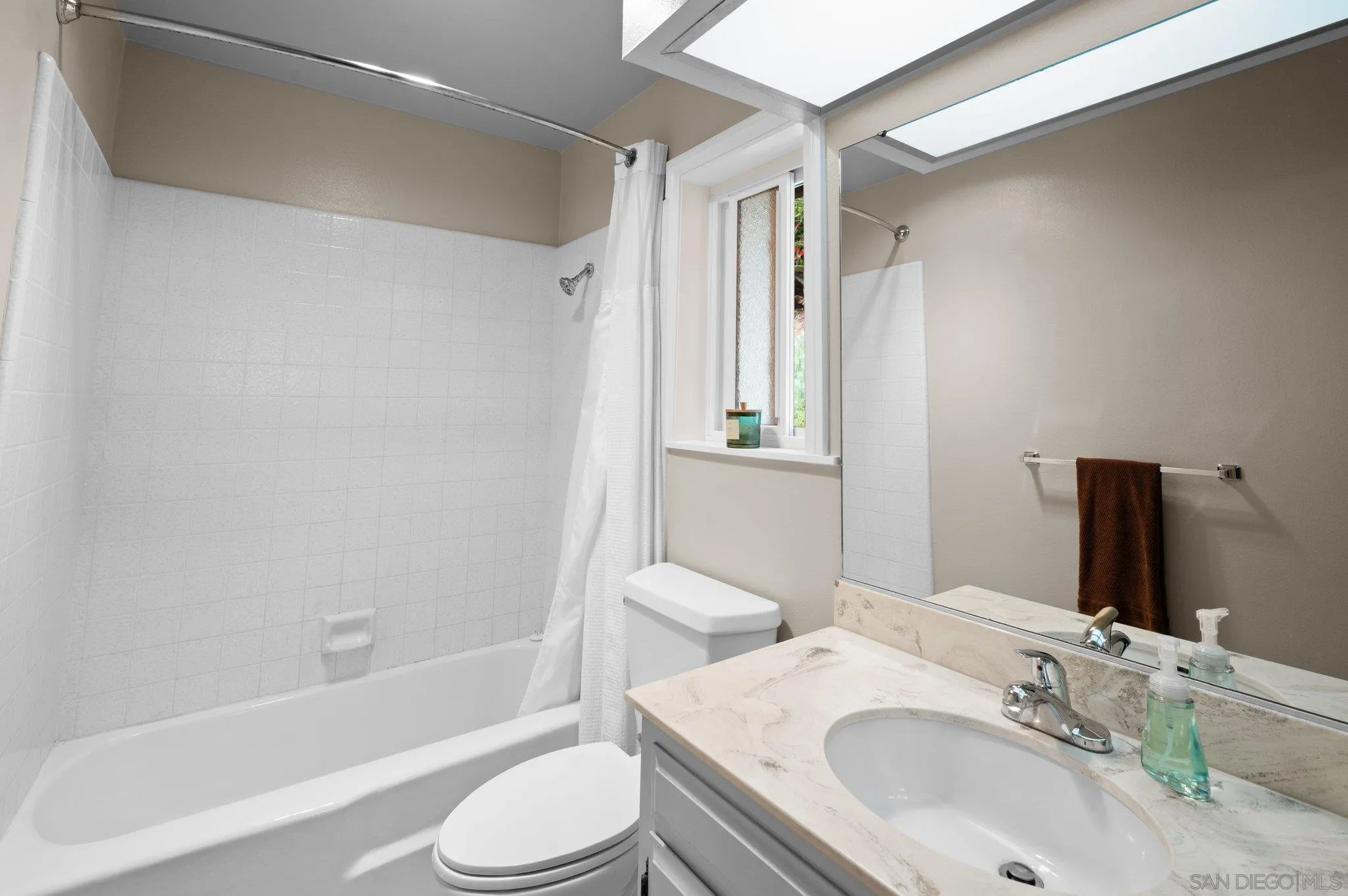 2189 Rockhoff Road Escondido, CA 92026 - Photo 35 of 60 a bathroom with a granite countertop sink toilet and shower