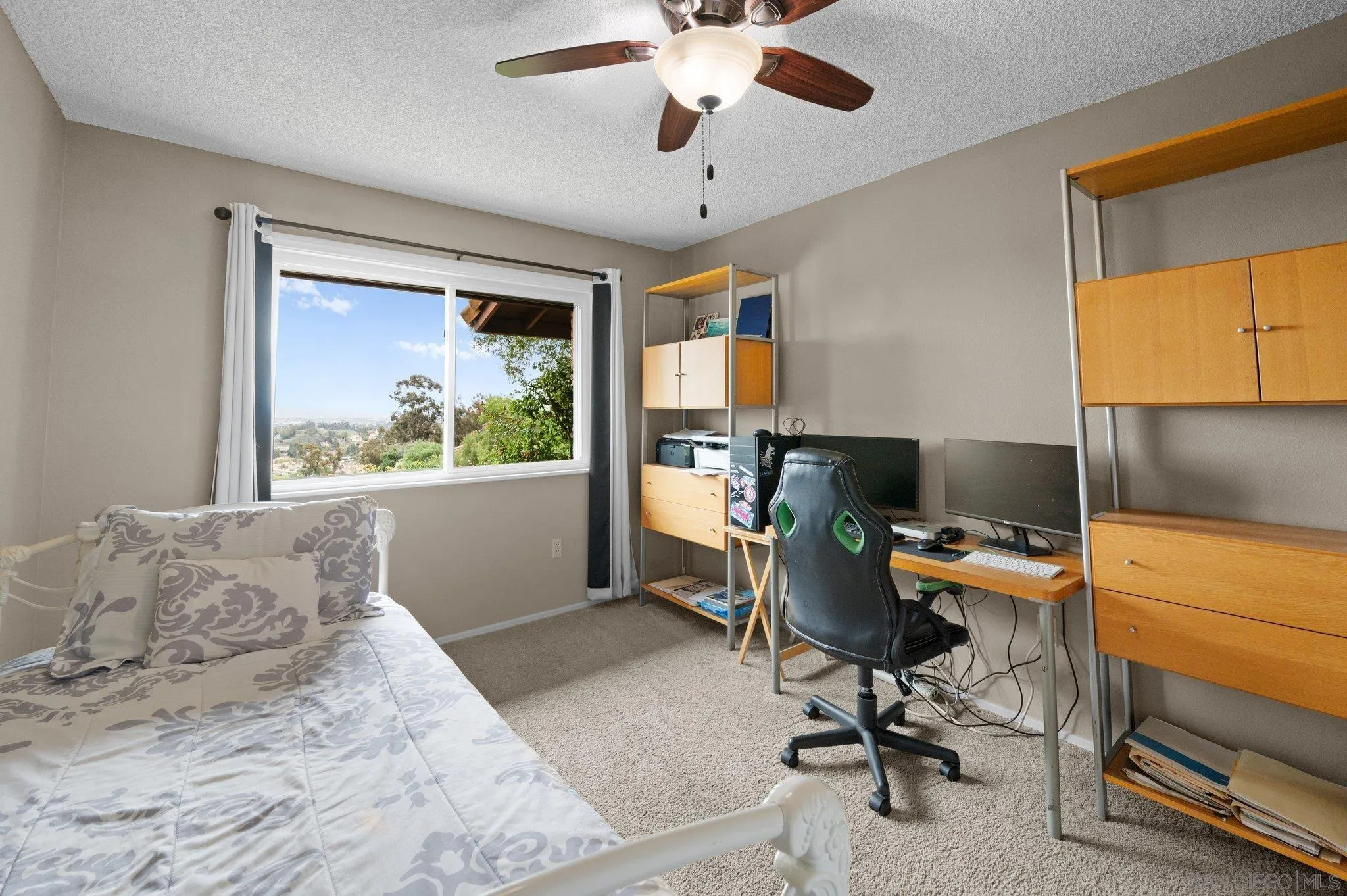 2189 Rockhoff Road Escondido, CA 92026 - Photo 41 of 60 a workspace with furniture and window