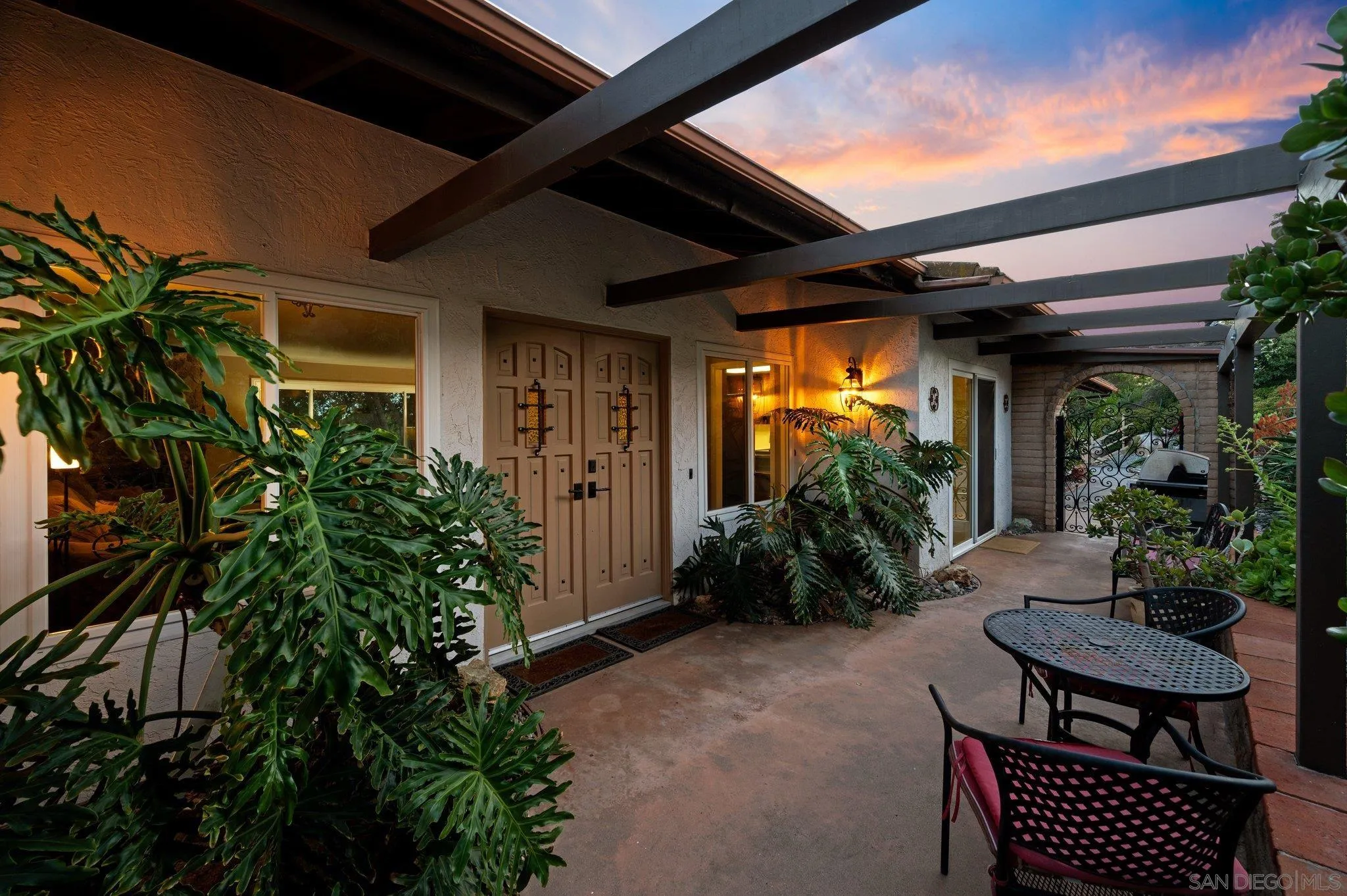 2189 Rockhoff Road Escondido, CA 92026 - Photo 55 of 60 a view of a porch with furniture and yard