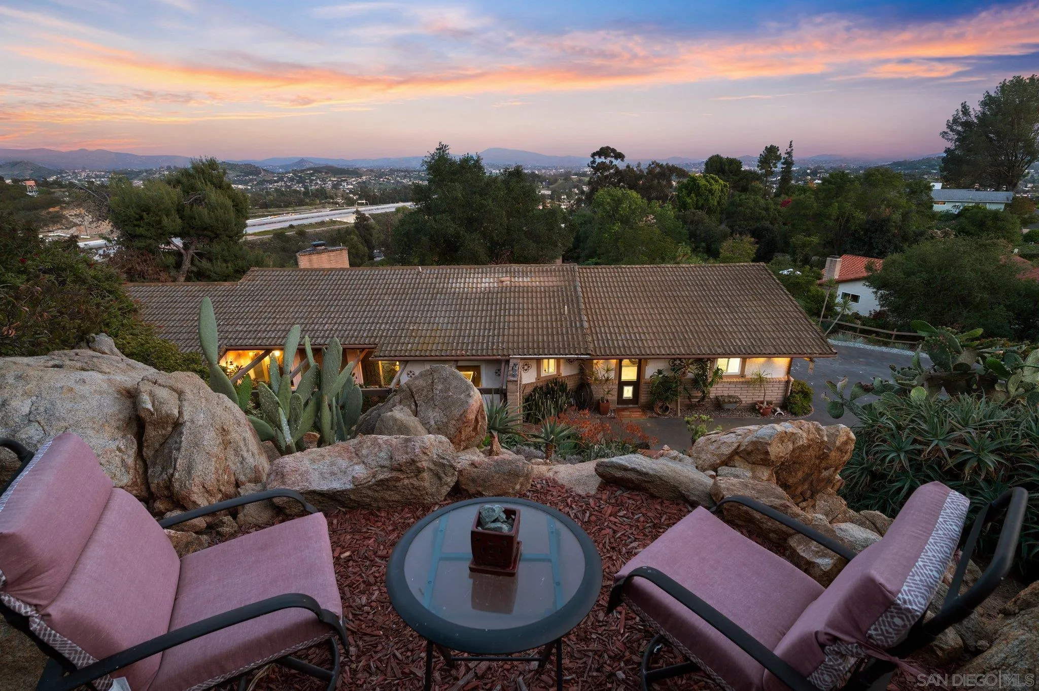 2189 Rockhoff Road Escondido, CA 92026 - Photo 56 of 60 an outdoor sitting area with furniture and a garden