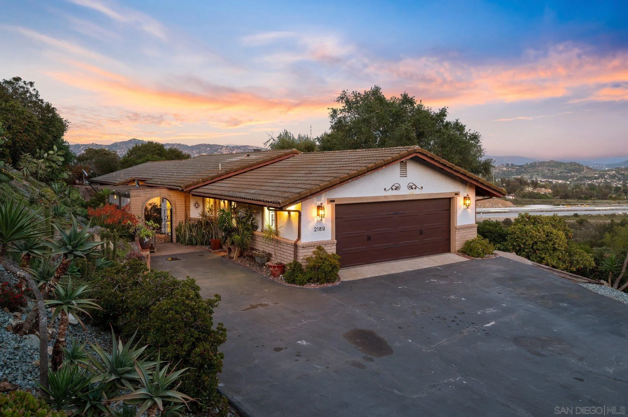 2189 Rockhoff Road Escondido, CA 92026 - Photo 58 of 60 a view of a house with wooden fence