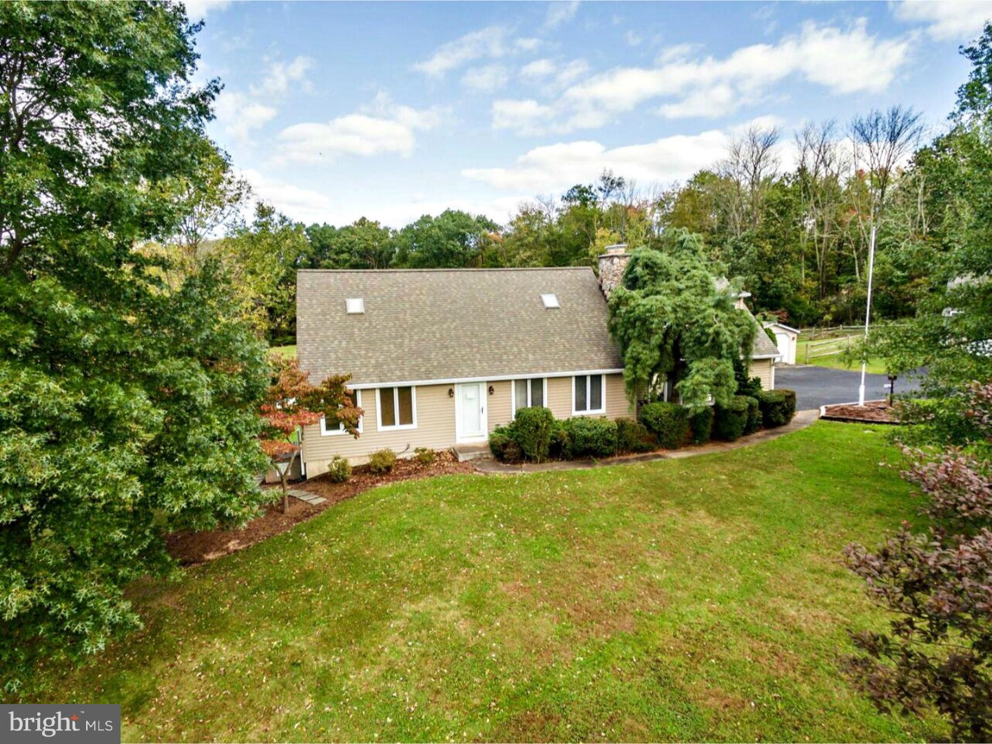 317 Clump Road Green Lane, PA 18054 - Photo 1 of 23 front view of house with a yard