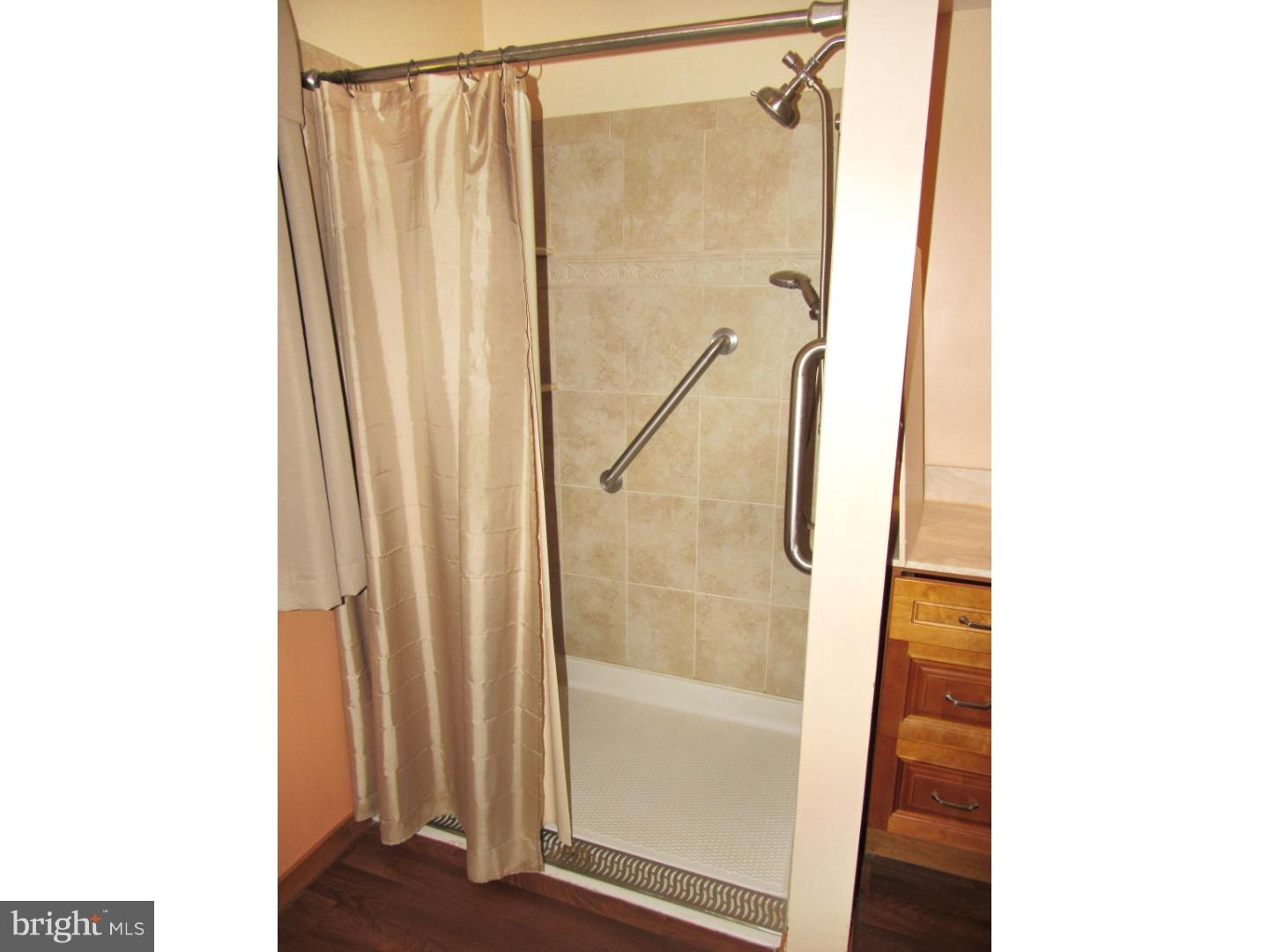 317 Clump Road Green Lane, PA 18054 - Photo 22 of 23 a bathroom with a shower and a window