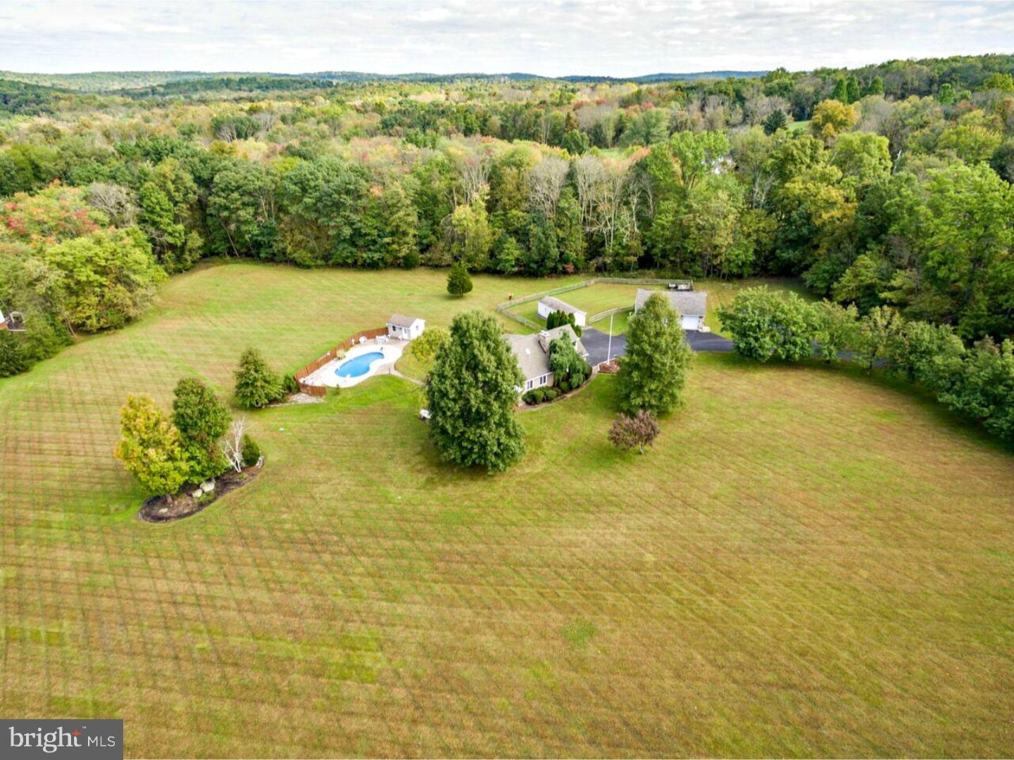 317 Clump Road Green Lane, PA 18054 - Photo 4 of 23 a view of a lake with a mountain
