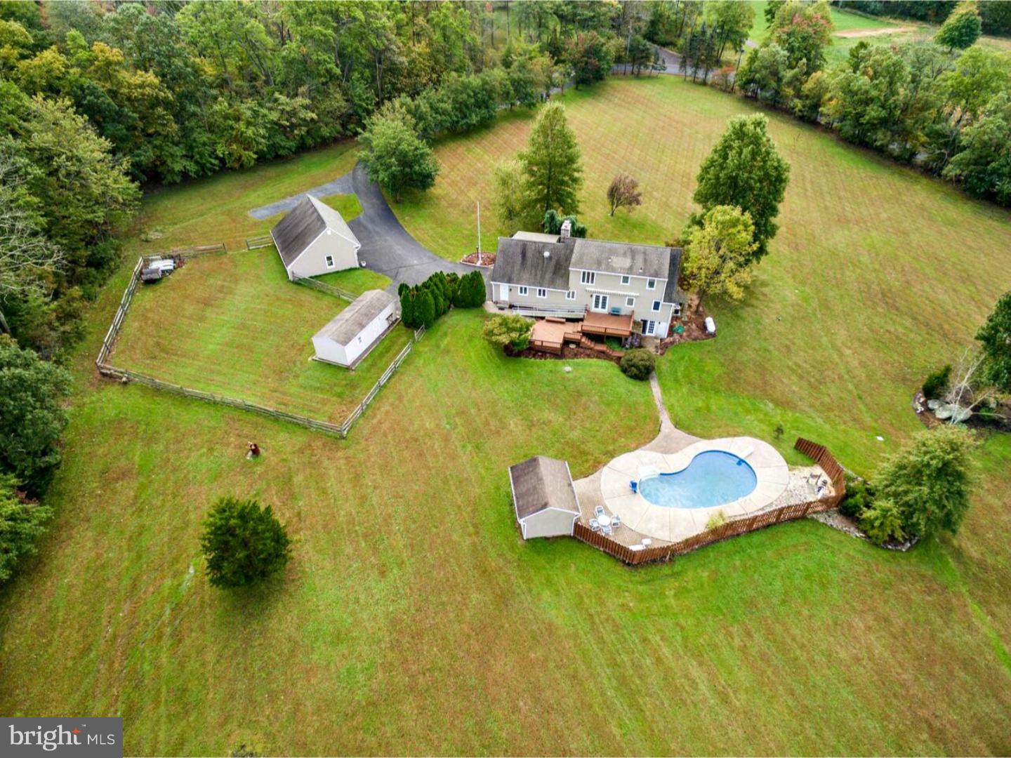 317 Clump Road Green Lane, PA 18054 - Photo 5 of 23 an aerial view of a house with a lake view