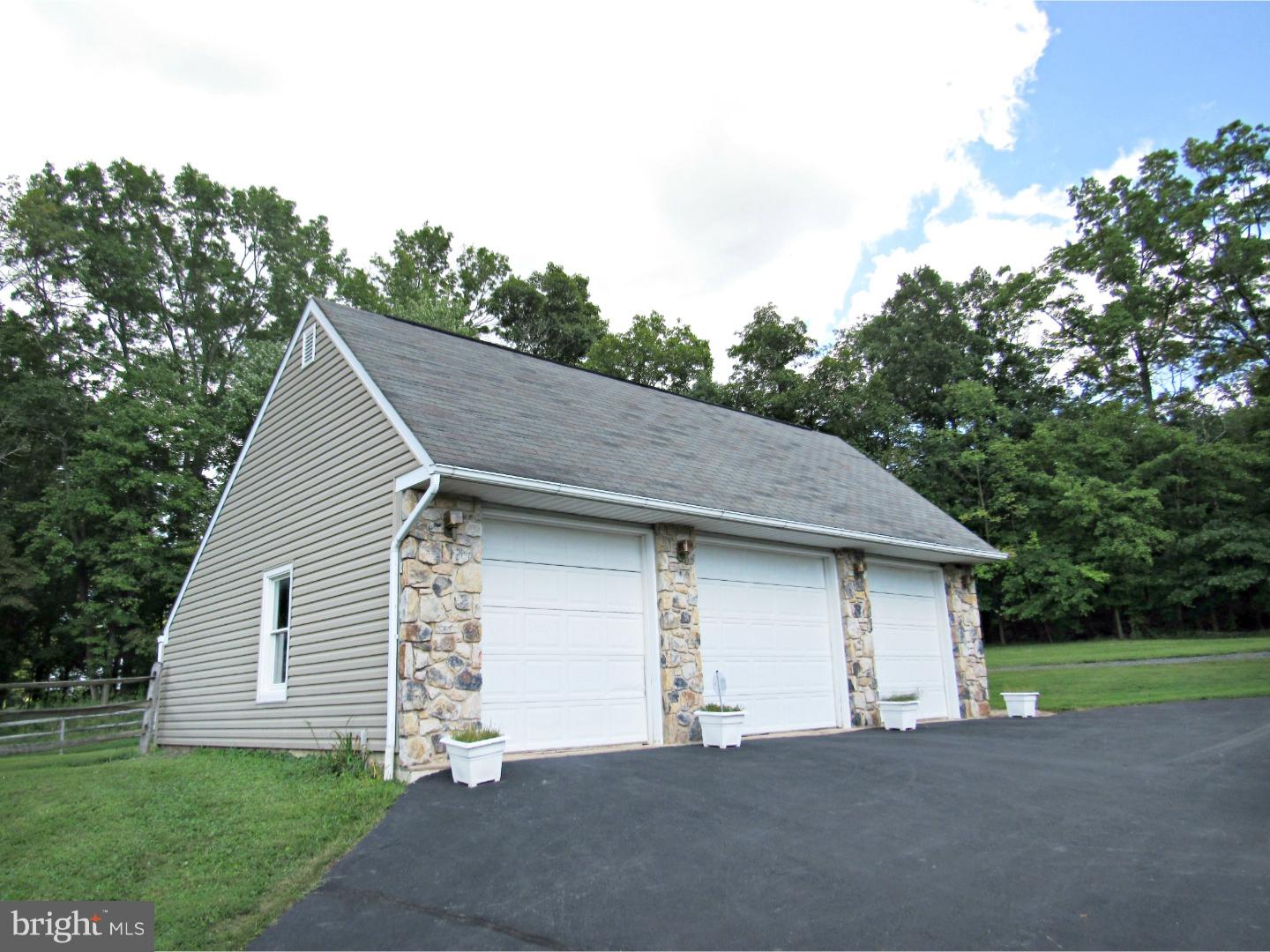 317 Clump Road Green Lane, PA 18054 - Photo 9 of 23 a house view with a garden space