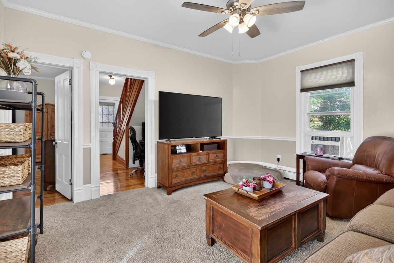 420 West Spring Street Woodstock, VA 22664 - Photo 12 of 67 a living room with furniture and a flat screen tv