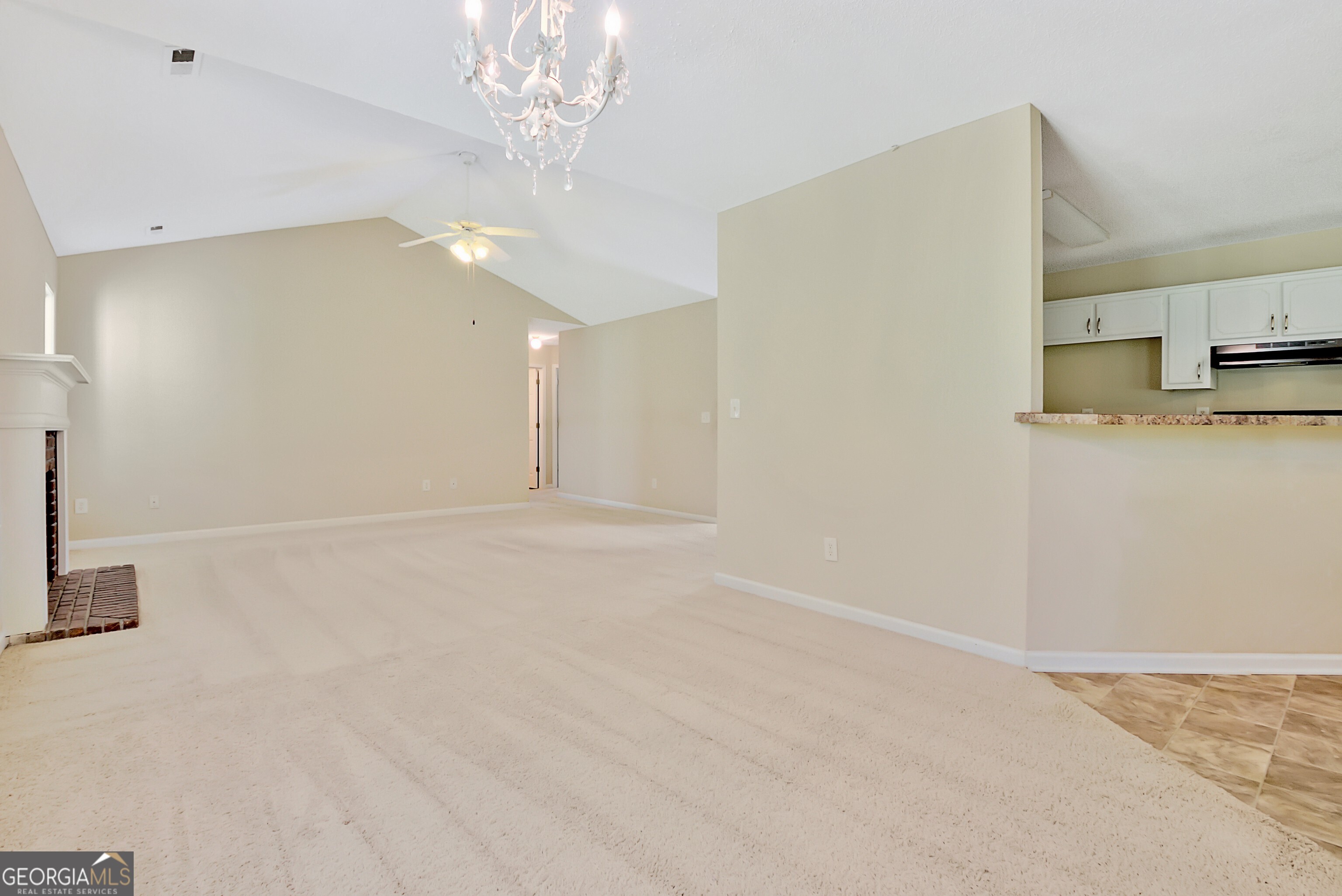45 Paces Landing Drive Newnan, GA 30263 - Photo 11 of 31 a view of a kitchen with a sink and a refrigerator