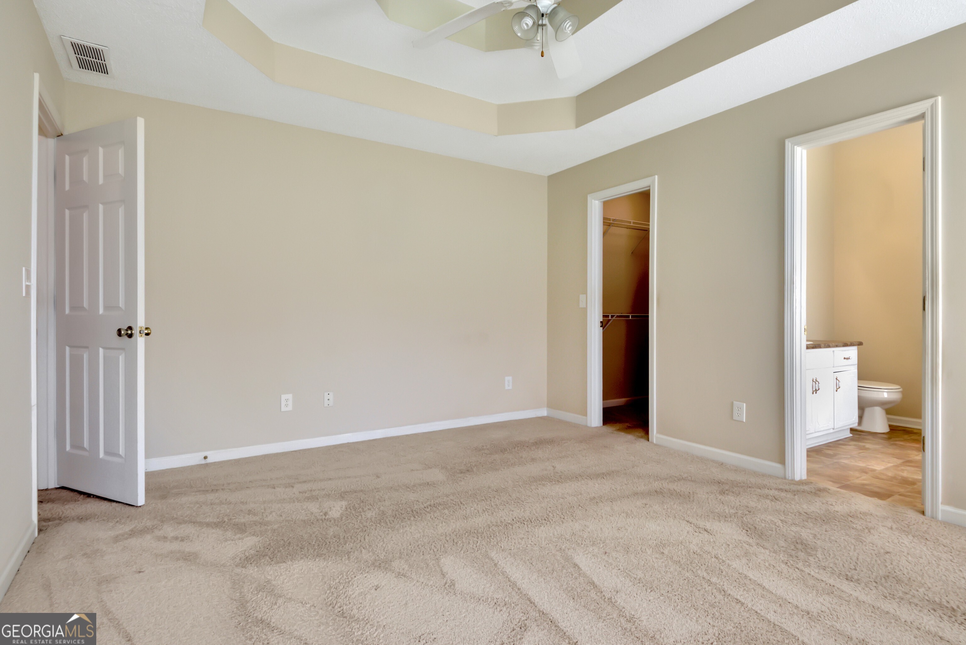 45 Paces Landing Drive Newnan, GA 30263 - Photo 18 of 31 an empty room with fan and a bathroom
