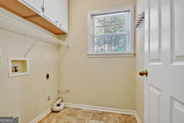 a view of a room with a large window