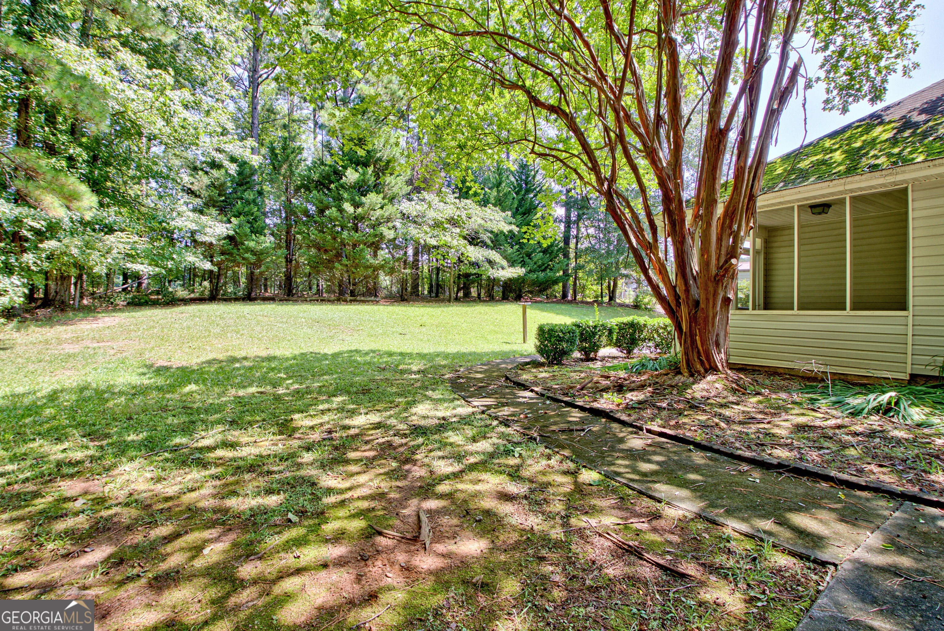 45 Paces Landing Drive Newnan, GA 30263 - Photo 30 of 31 a view of outdoor space with deck and tree