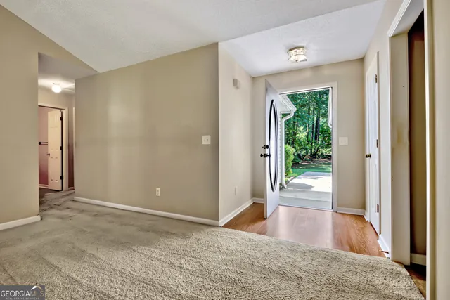 a view of entryway with wooden floor
