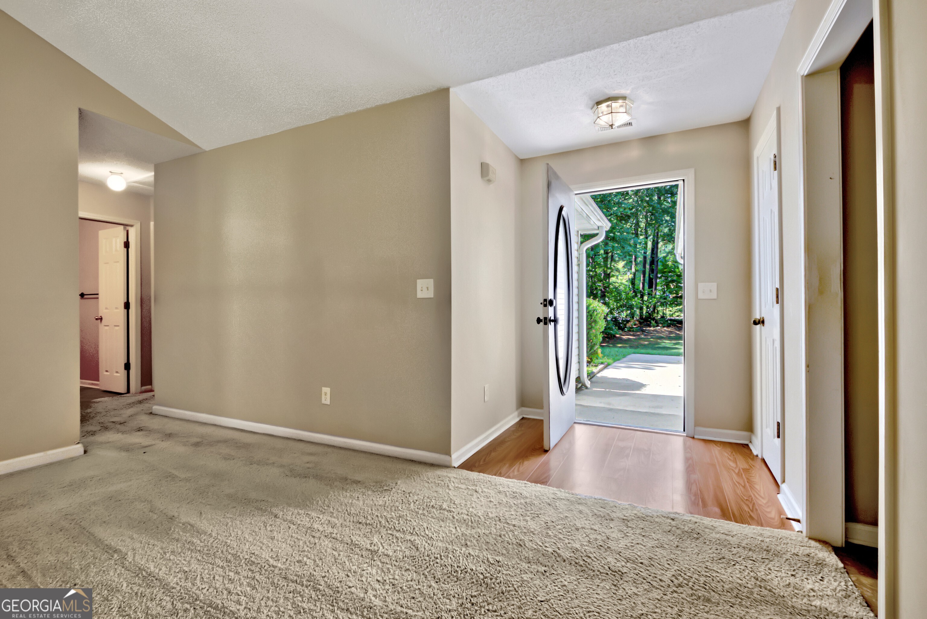 45 Paces Landing Drive Newnan, GA 30263 - Photo 6 of 31 a view of entryway with wooden floor