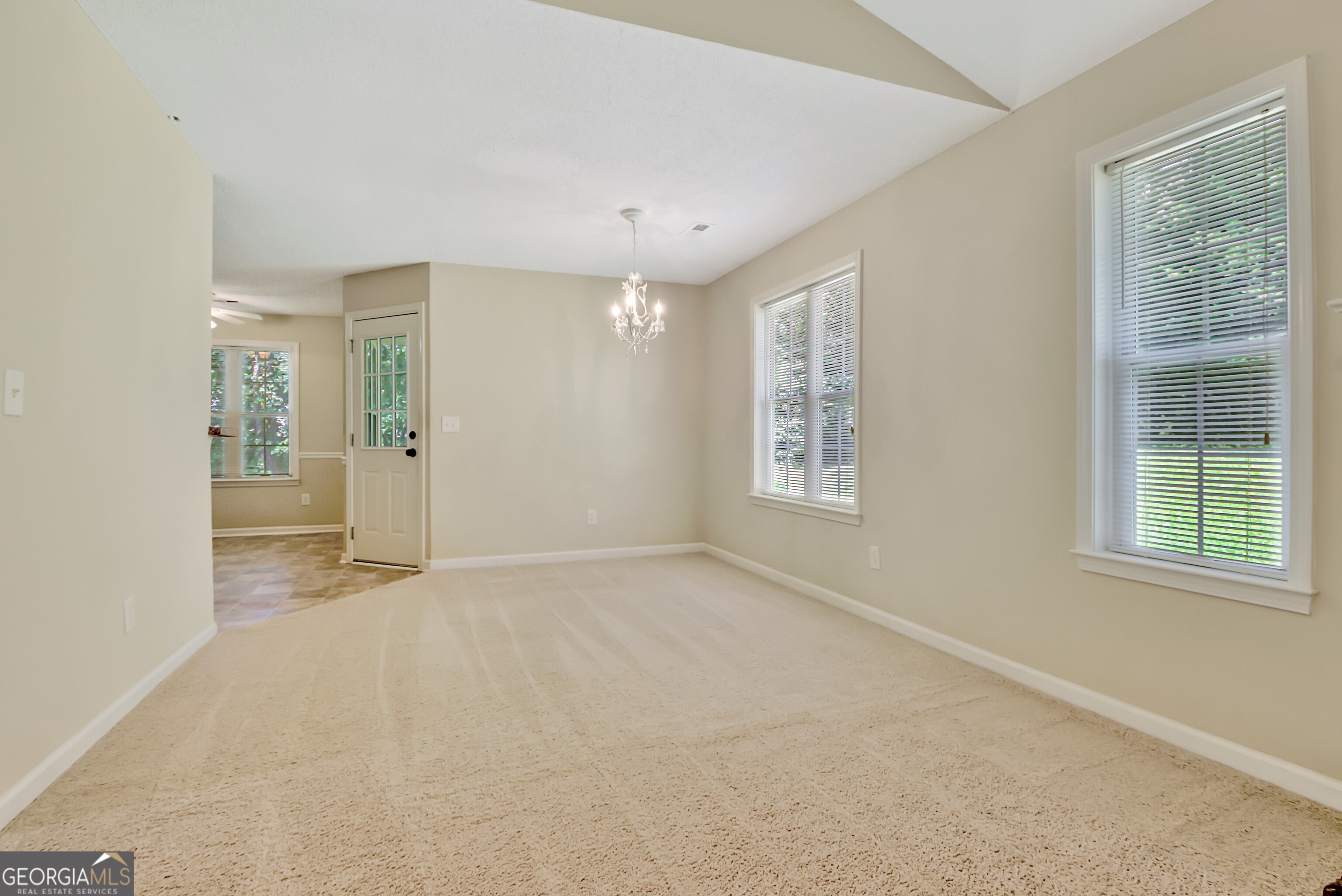 45 Paces Landing Drive Newnan, GA 30263 - Photo 10 of 31 an empty room with windows and closet