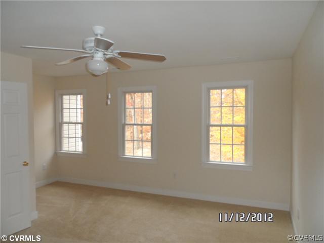 3769 Three Chopt Road Gum Spring, VA 23065 - Photo 7 of 10 a view of an empty room with a window