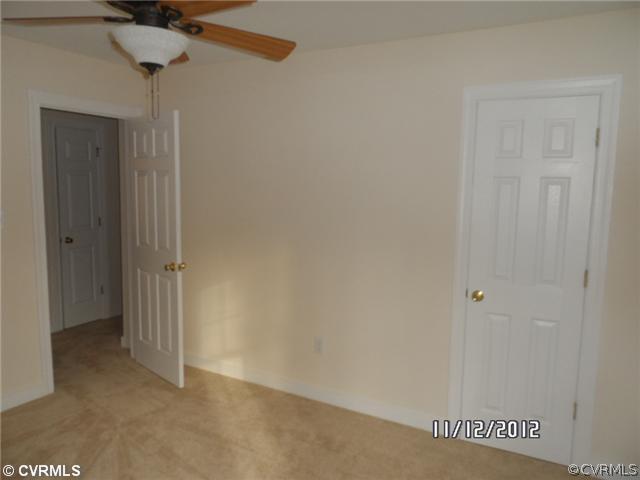 3769 Three Chopt Road Gum Spring, VA 23065 - Photo 8 of 10 a view of a hallway with a elevator