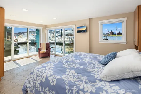 a bedroom with a bed and dresser