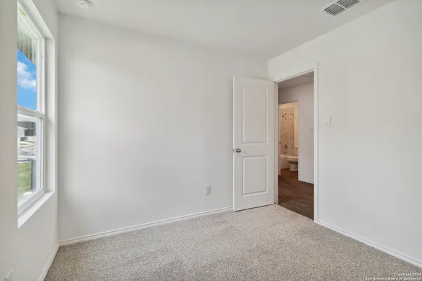 an empty room with a window