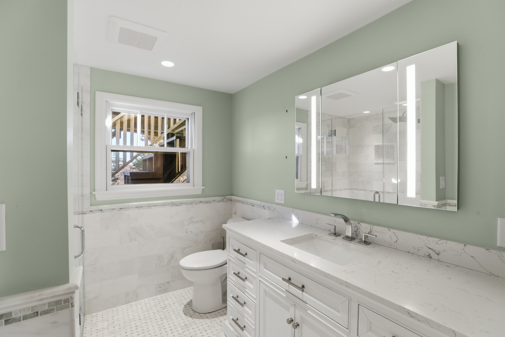 31 Flintlock Road Nantucket, MA 02554 - Photo 14 of 23 a bathroom with a toilet sink and mirror