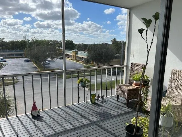 a view of a balcony with couch