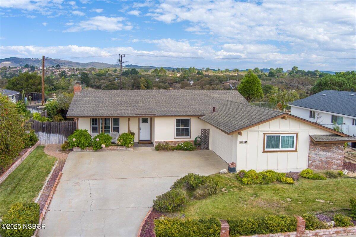 3987 Agena Way Lompoc, CA 93436 - Photo 3 of 40 front view of a house with a yard