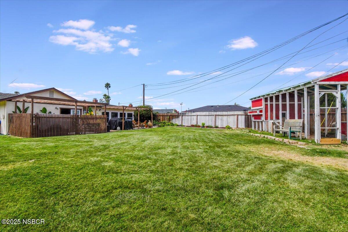 3987 Agena Way Lompoc, CA 93436 - Photo 35 of 40 a view of a house with backyard and sitting area