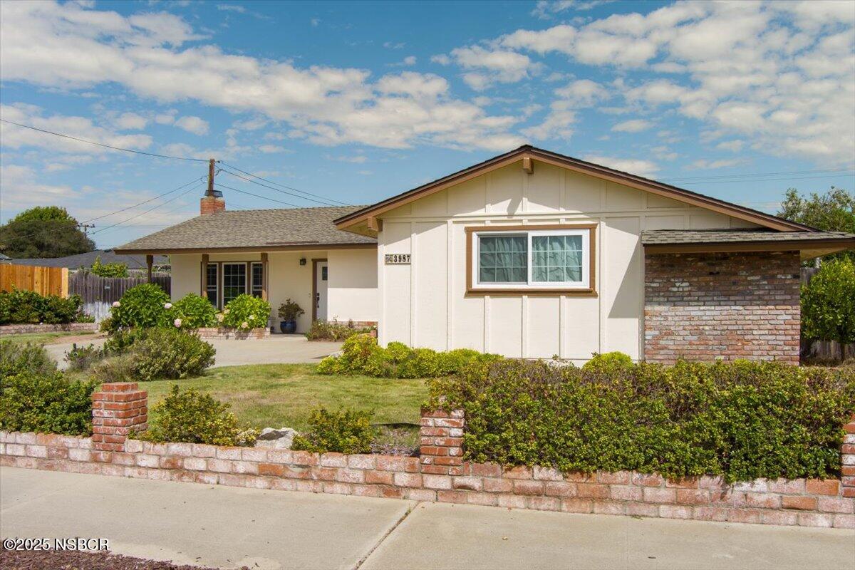 3987 Agena Way Lompoc, CA 93436 - Photo 4 of 40 a front view of a house with a yard