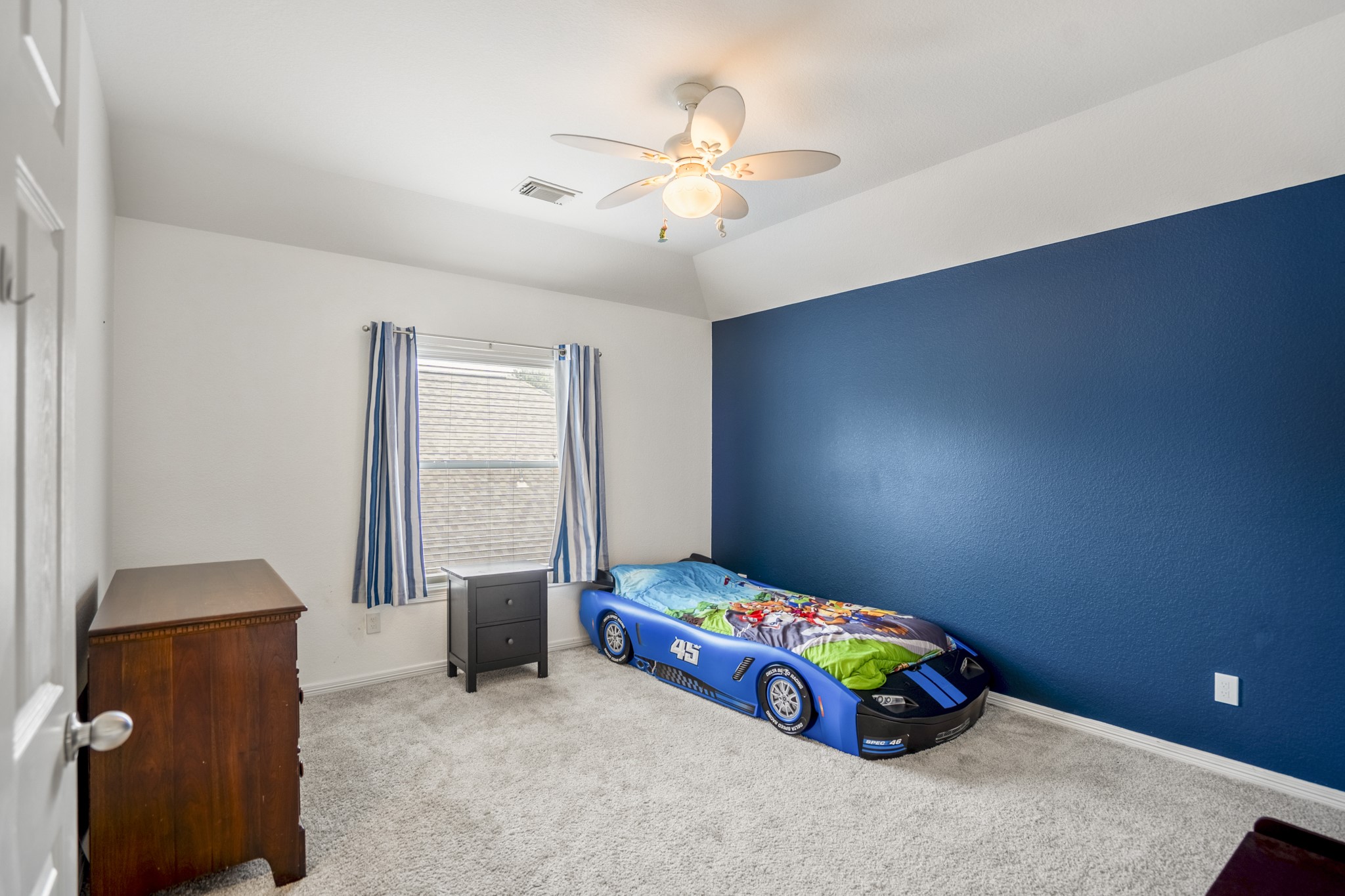 10410 Pitcataway Drive Spring, TX 77379 - Photo 23 of 48 The second bedroom upstairs has a good size closet, a nice size window and lighted ceiling fan, the home features 4 bedrooms with 3 full size bathrooms and 1 guest bathroom.