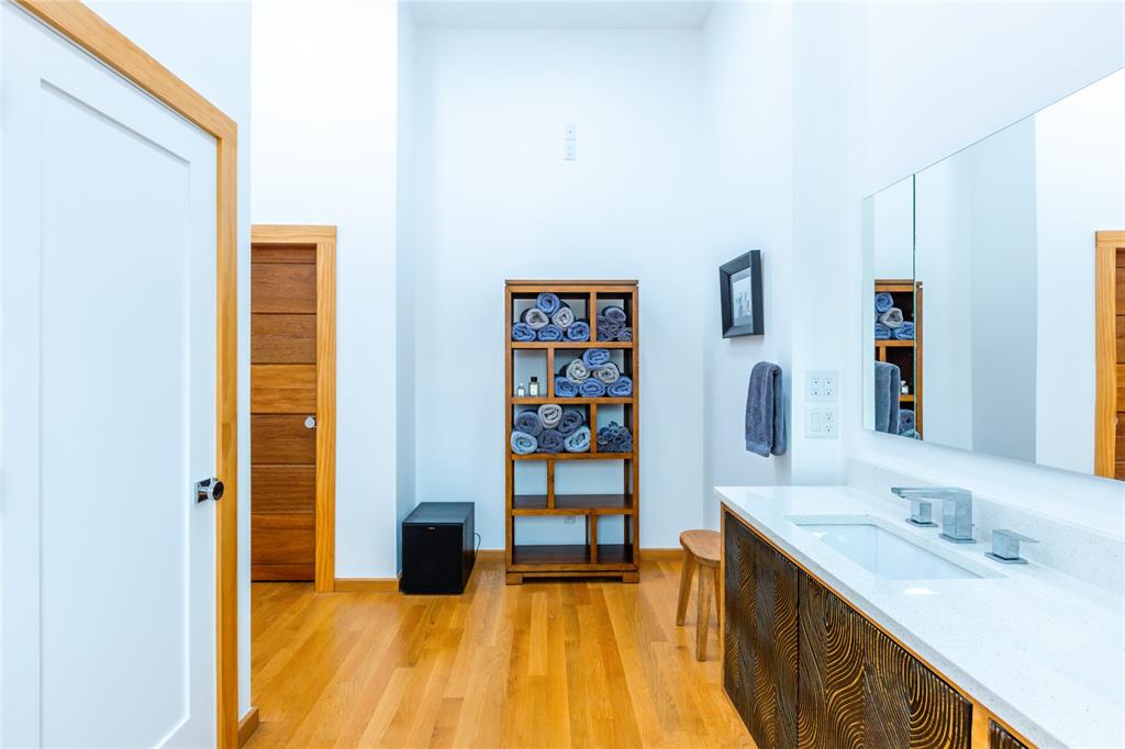 511 County Road 4264 Bonham, TX 75418 - Photo 27 of 40 a bathroom with a sink and a mirror