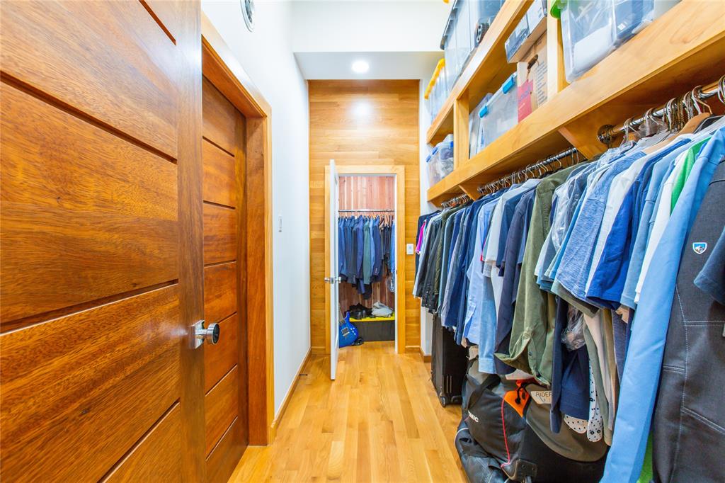 511 County Road 4264 Bonham, TX 75418 - Photo 30 of 40 a view of walk in closet with clothes and shoes