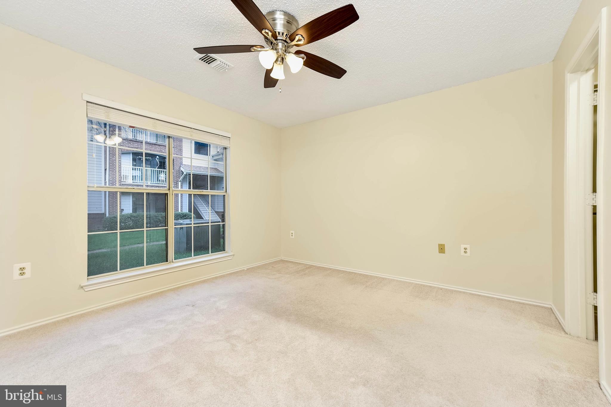 21009 Timber Ridge Terrace, Unit 104 Ashburn, VA 20147 - Photo 7 of 18 Large, Light-filled Bedroom