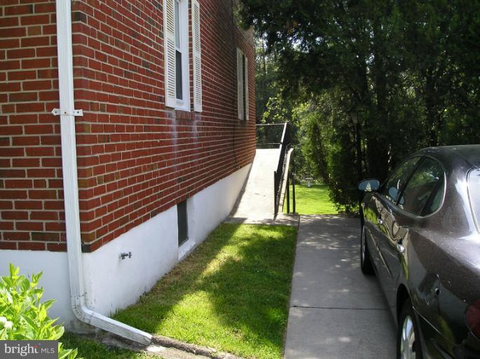 6813 Queens Ferry Road Baltimore, MD 21239 - Photo 2 of 19 a view of a back yard