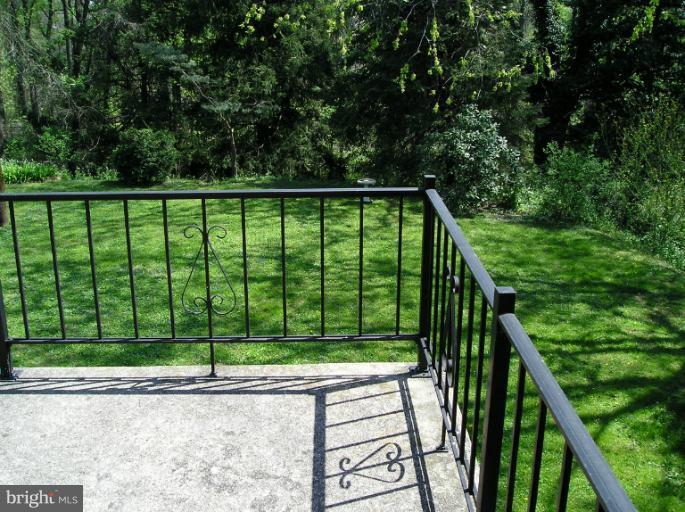 6813 Queens Ferry Road Baltimore, MD 21239 - Photo 3 of 19 a view of a backyard