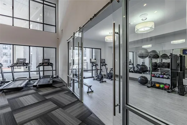 a view of a room with gym equipment
