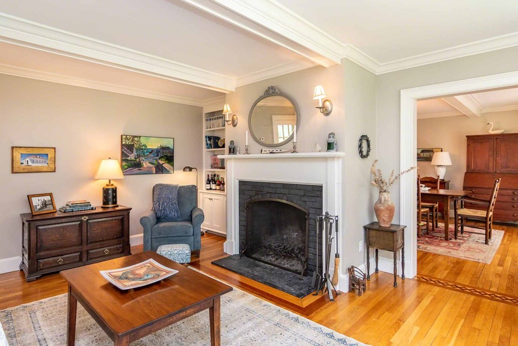 23 Indian Hollow Road West Tisbury, MA 02568 - Photo 12 of 42 a living room with furniture and a fireplace