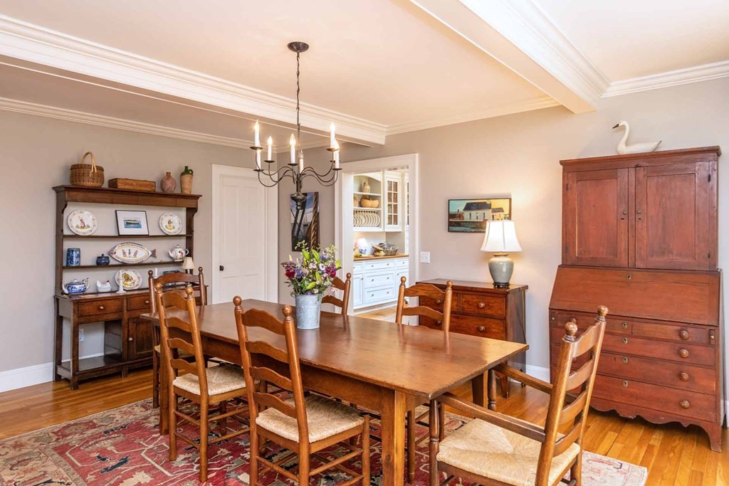 23 Indian Hollow Road West Tisbury, MA 02568 - Photo 13 of 42 a view of a dining room with furniture and wooden floor