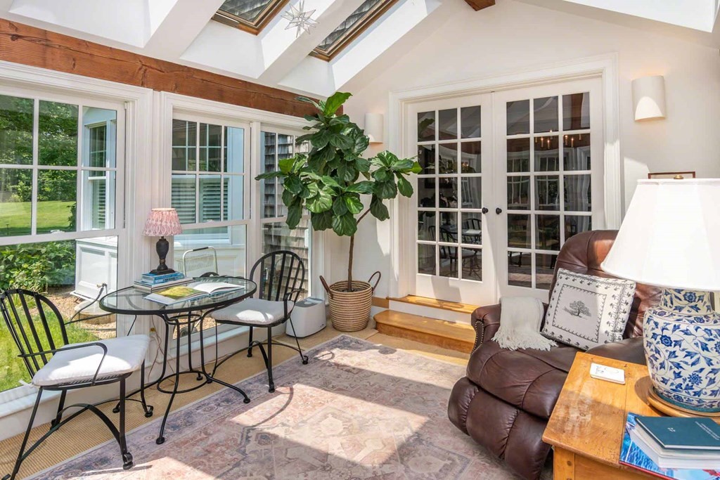 23 Indian Hollow Road West Tisbury, MA 02568 - Photo 20 of 42 a outdoor living space with furniture and a potted plant