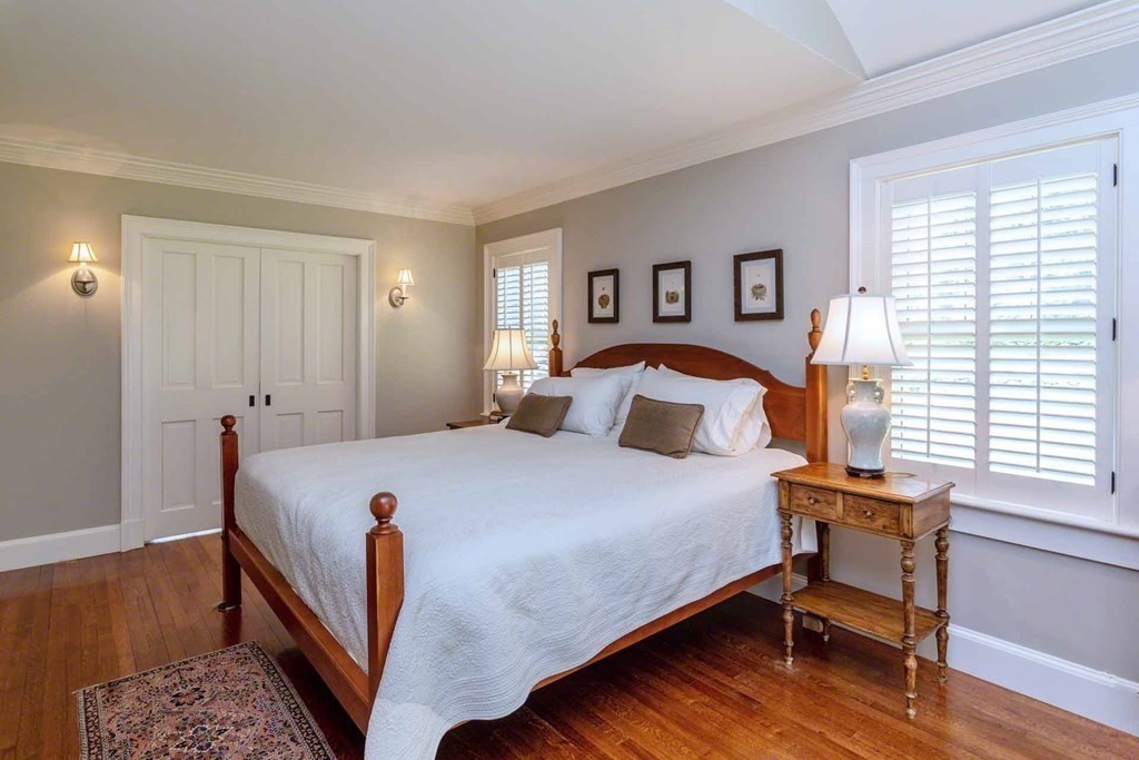 23 Indian Hollow Road West Tisbury, MA 02568 - Photo 24 of 42 a bedroom with a bed and a window